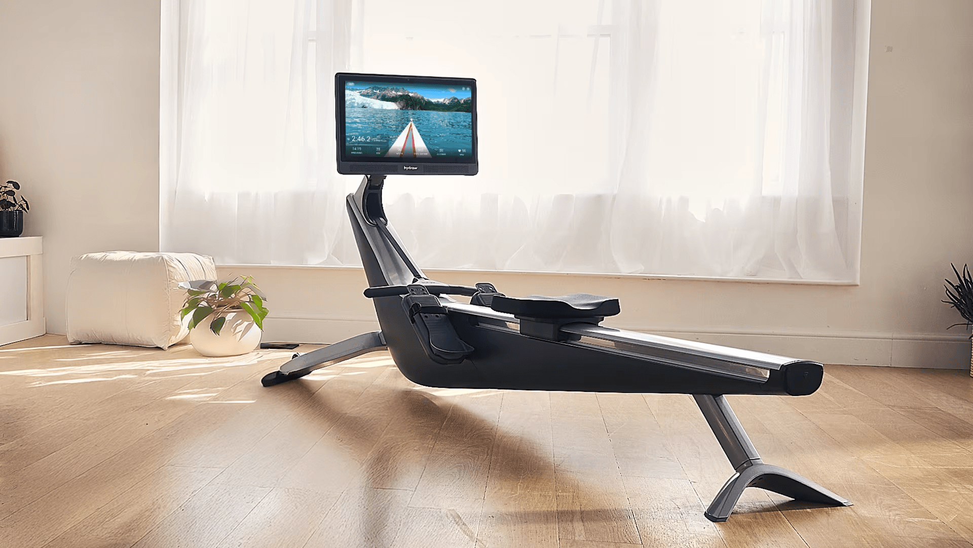 Hydrow Core rowing machine in a living room space.