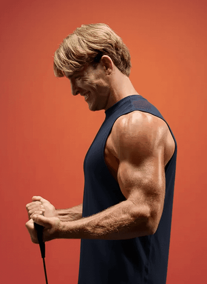 Man using LYQUID handles for biceps curls