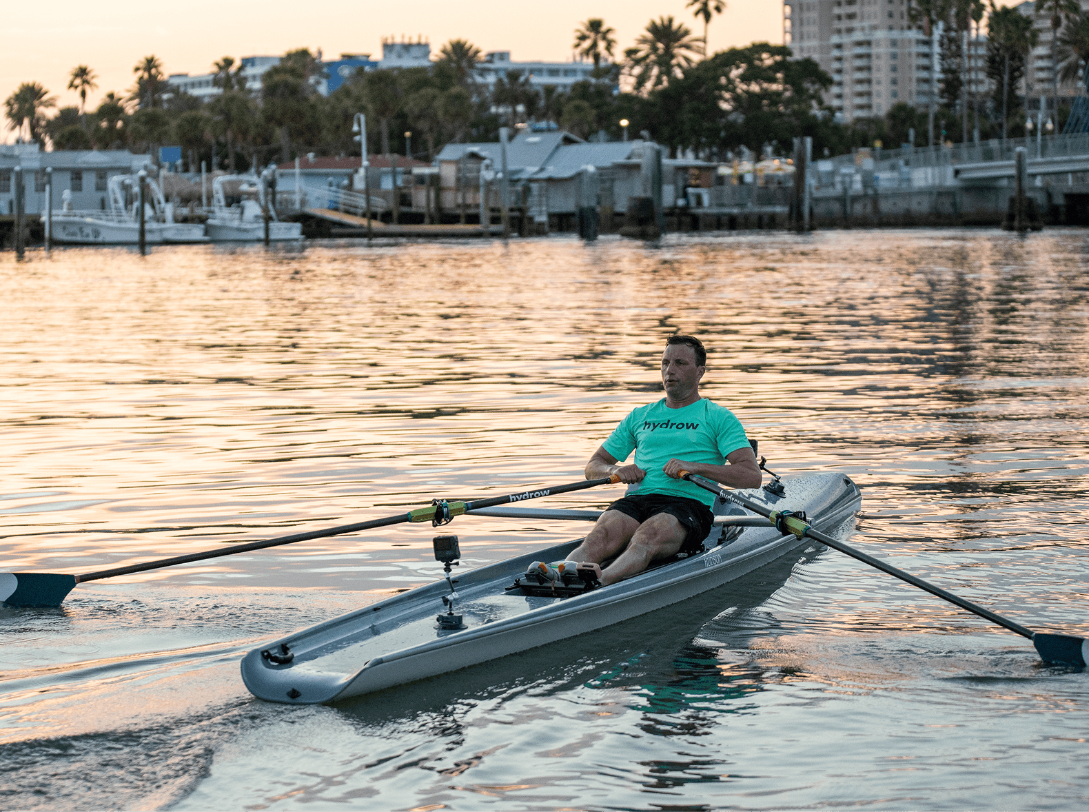 Coach Mike leading a HIIT row at Clearwater Beach