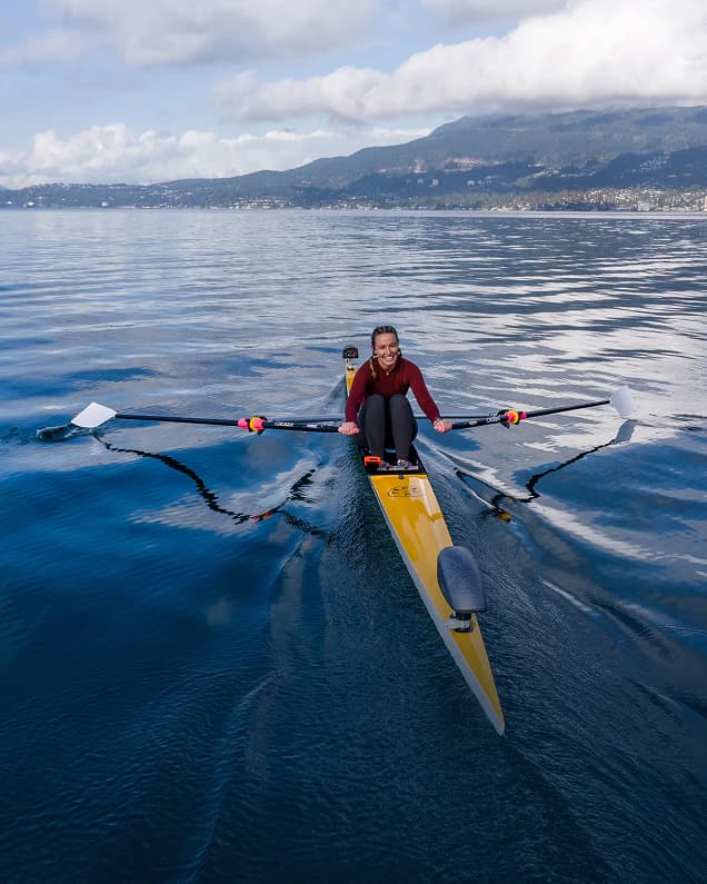 A Hydrow athlete sculling alone on open water