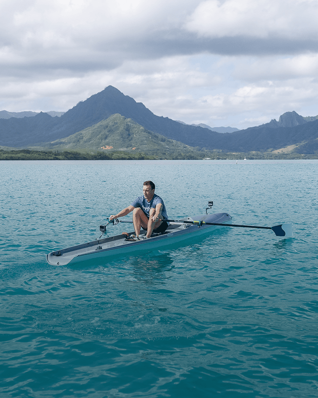 Coach Mike leading an endurance row in Hawaii