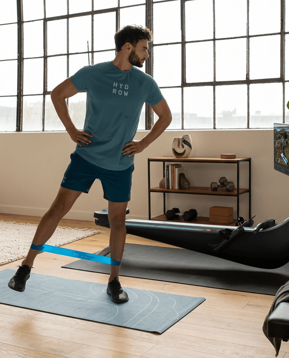 A person doing a resistance-band lunge on a mat during a cross-training workout at home