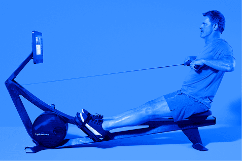 side view of man on a Hydrow Rower