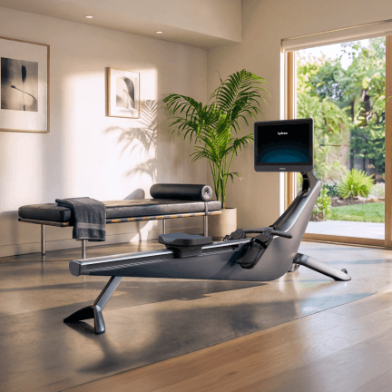 Hydrow Origin in a bright living room next to a garden window