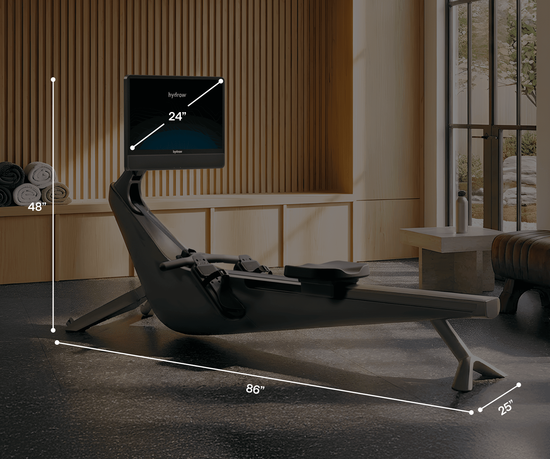 Hydrow Arc rower displaying its dimensions: 86" L x 25" W x 48" H with a 24" screen.